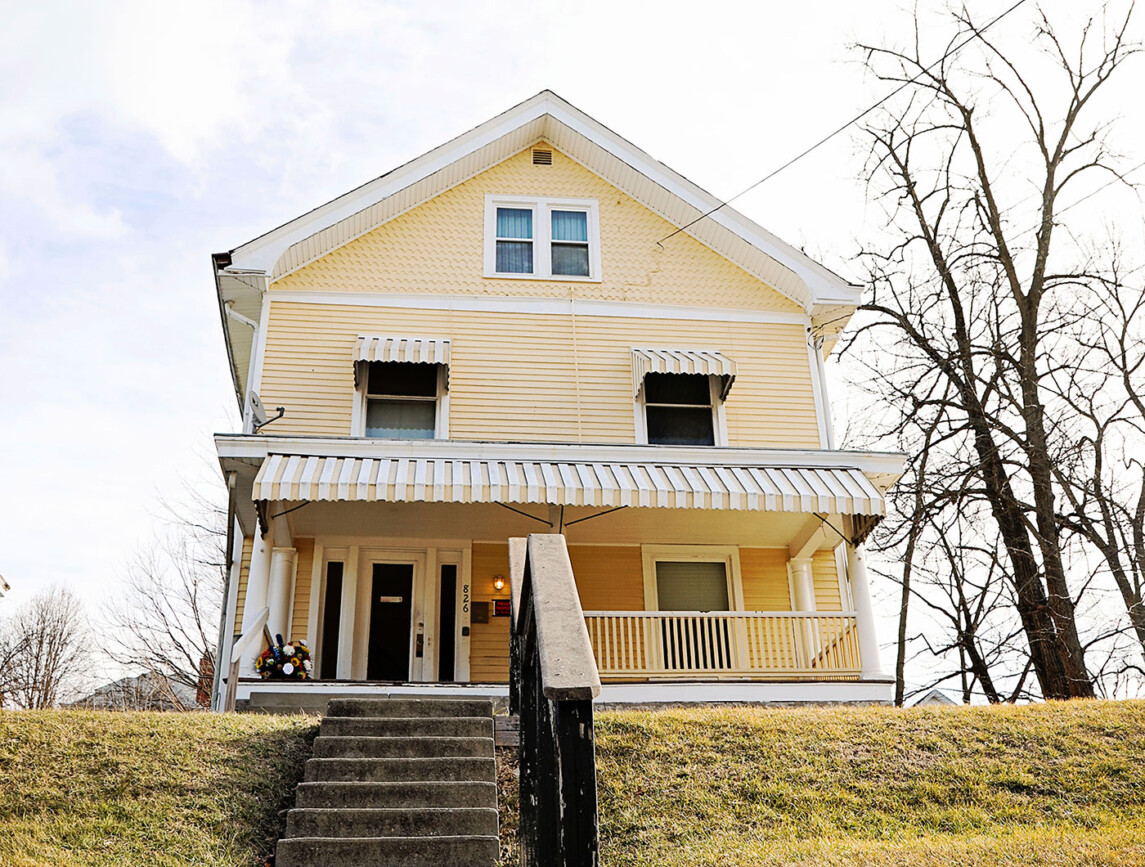 Yellow house with front steps